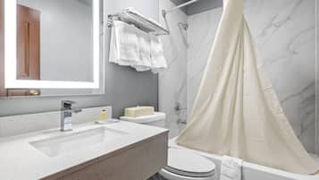 Double Room, 2 Double Beds | Bathroom | Combined shower/tub, free toiletries, hair dryer, towels