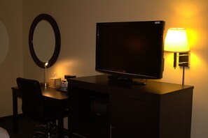 Desk, laptop workspace, blackout curtains, iron/ironing board