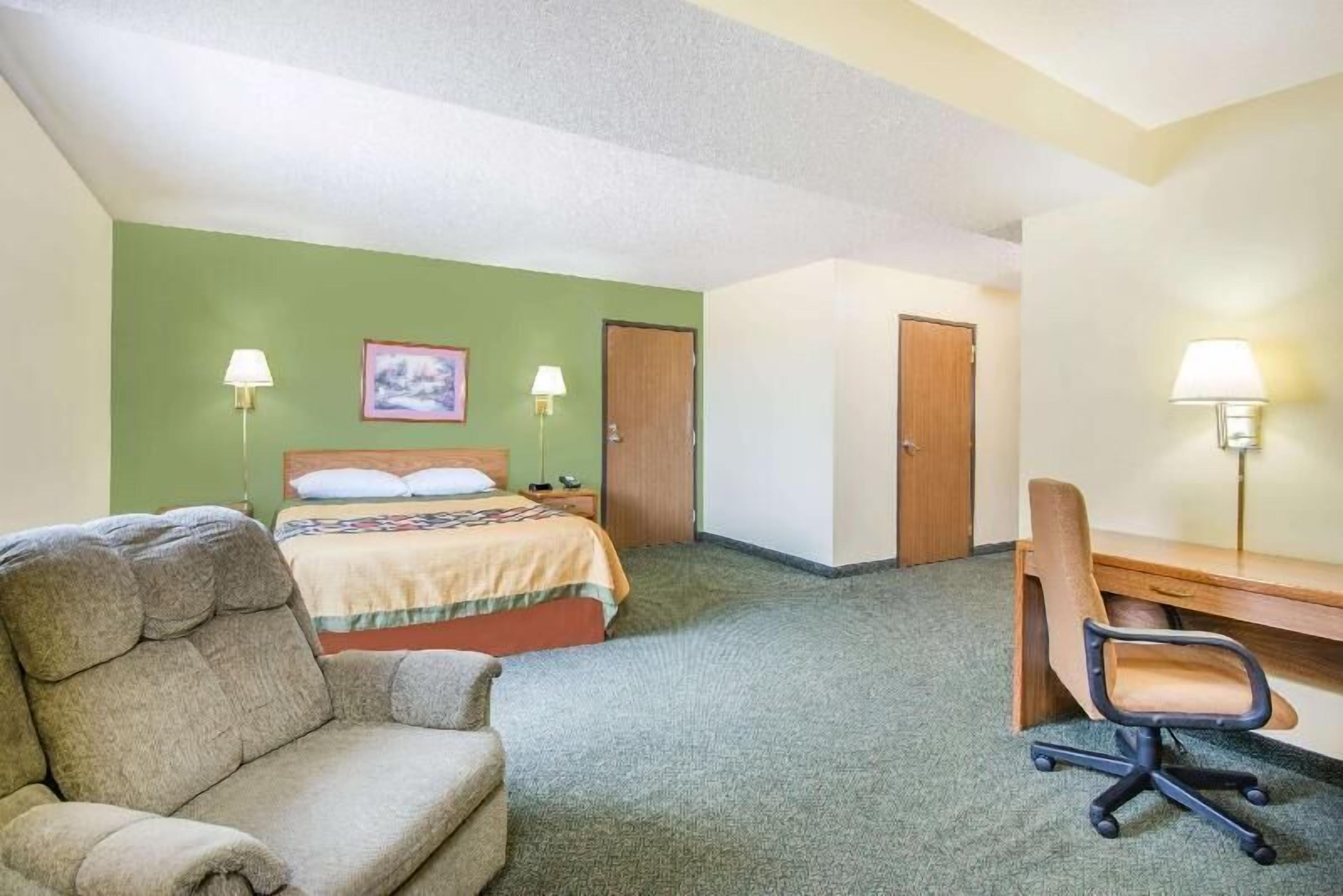 Desk, laptop workspace, blackout curtains, iron/ironing board