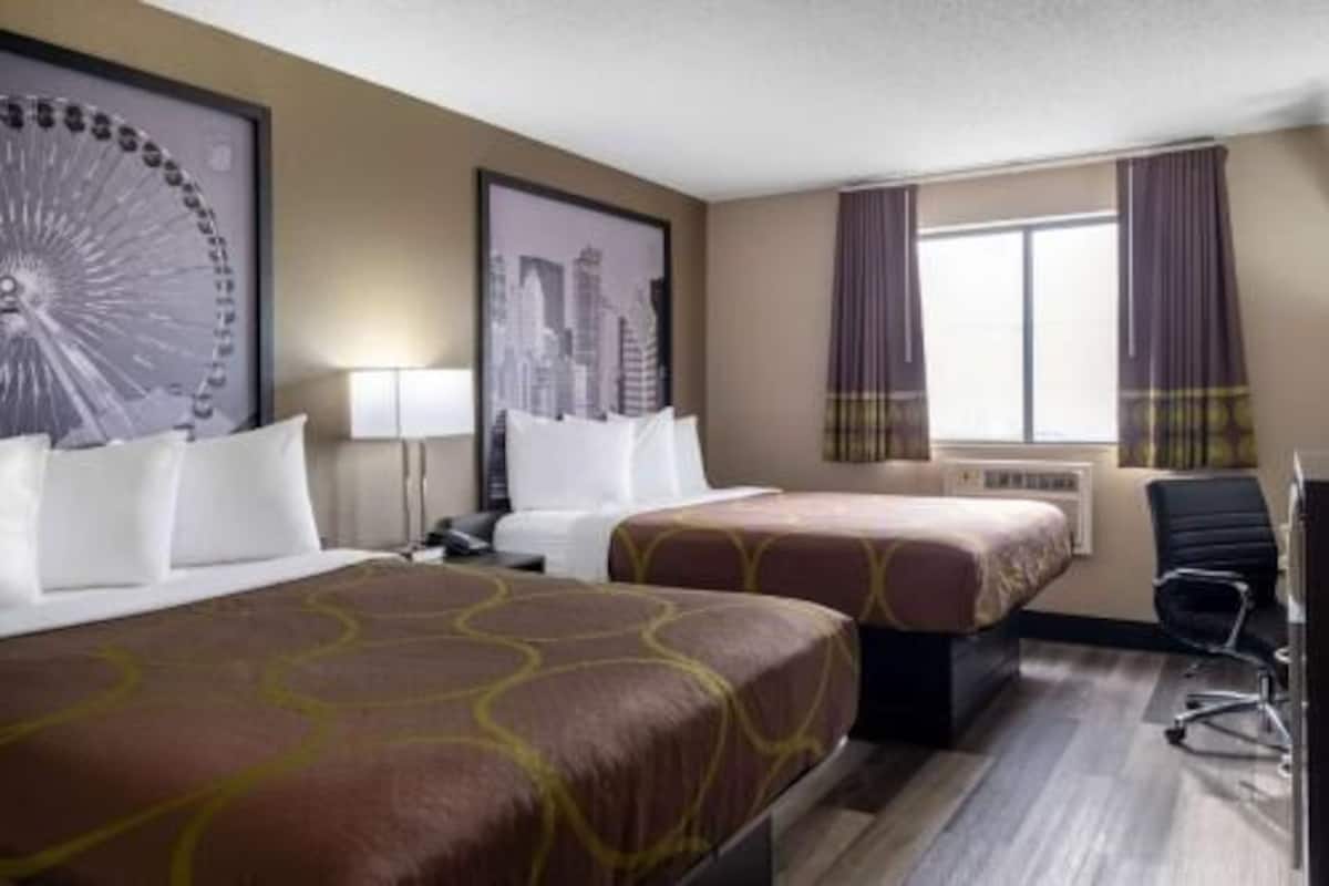Pillowtop beds, desk, laptop workspace, blackout drapes
