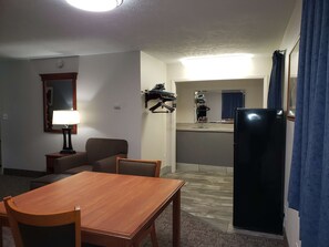Standard Room, 1 King Bed, Non Smoking, Refrigerator & Microwave (Larger Room) | 1 bedroom, desk, blackout drapes, iron/ironing board
