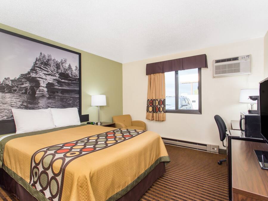 Desk, blackout drapes, iron/ironing board, rollaway beds