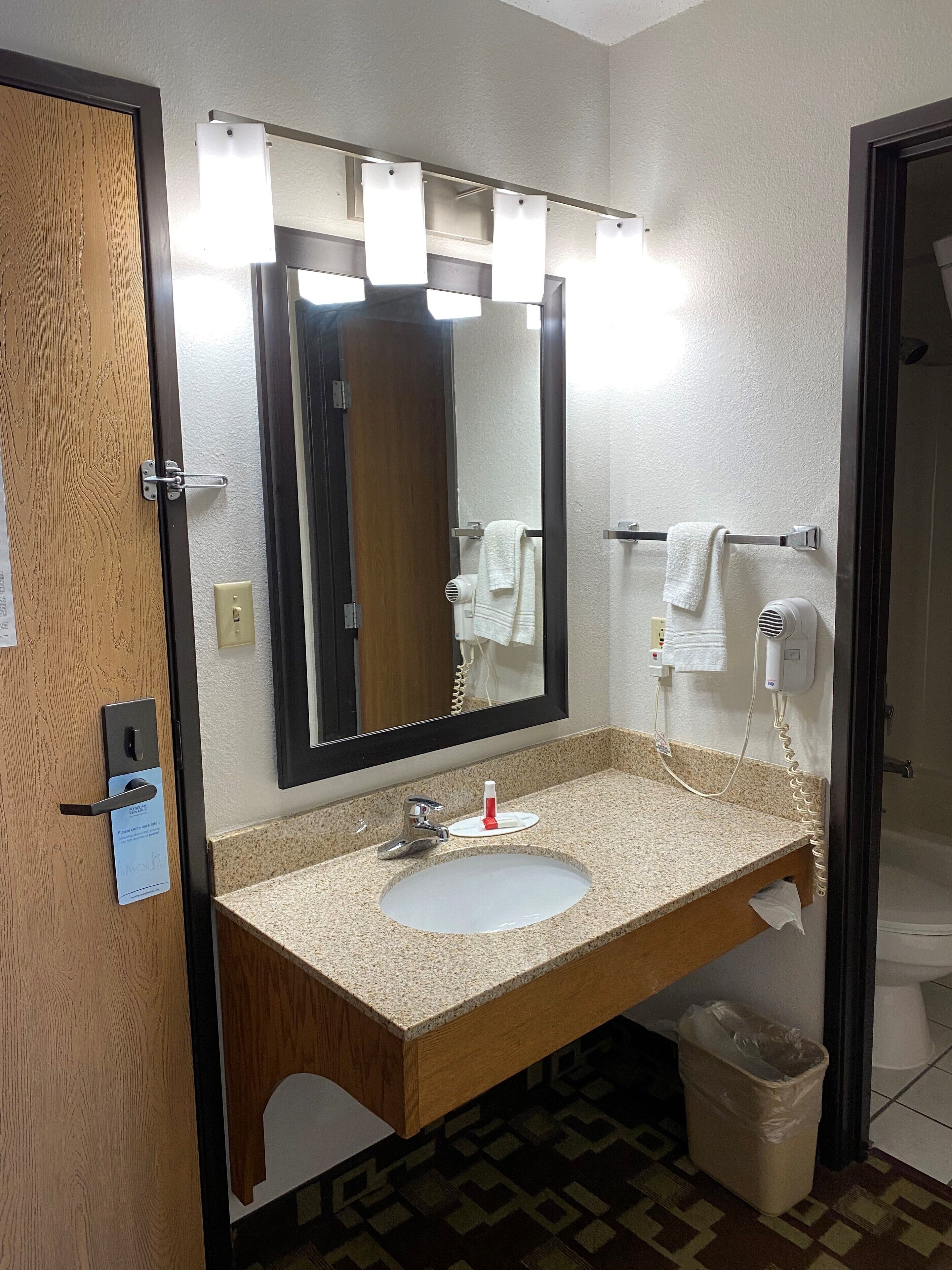 suite, 1 king bed, non smoking | bathroom | combined shower/bathtub, free toiletries, hair dryer, towels