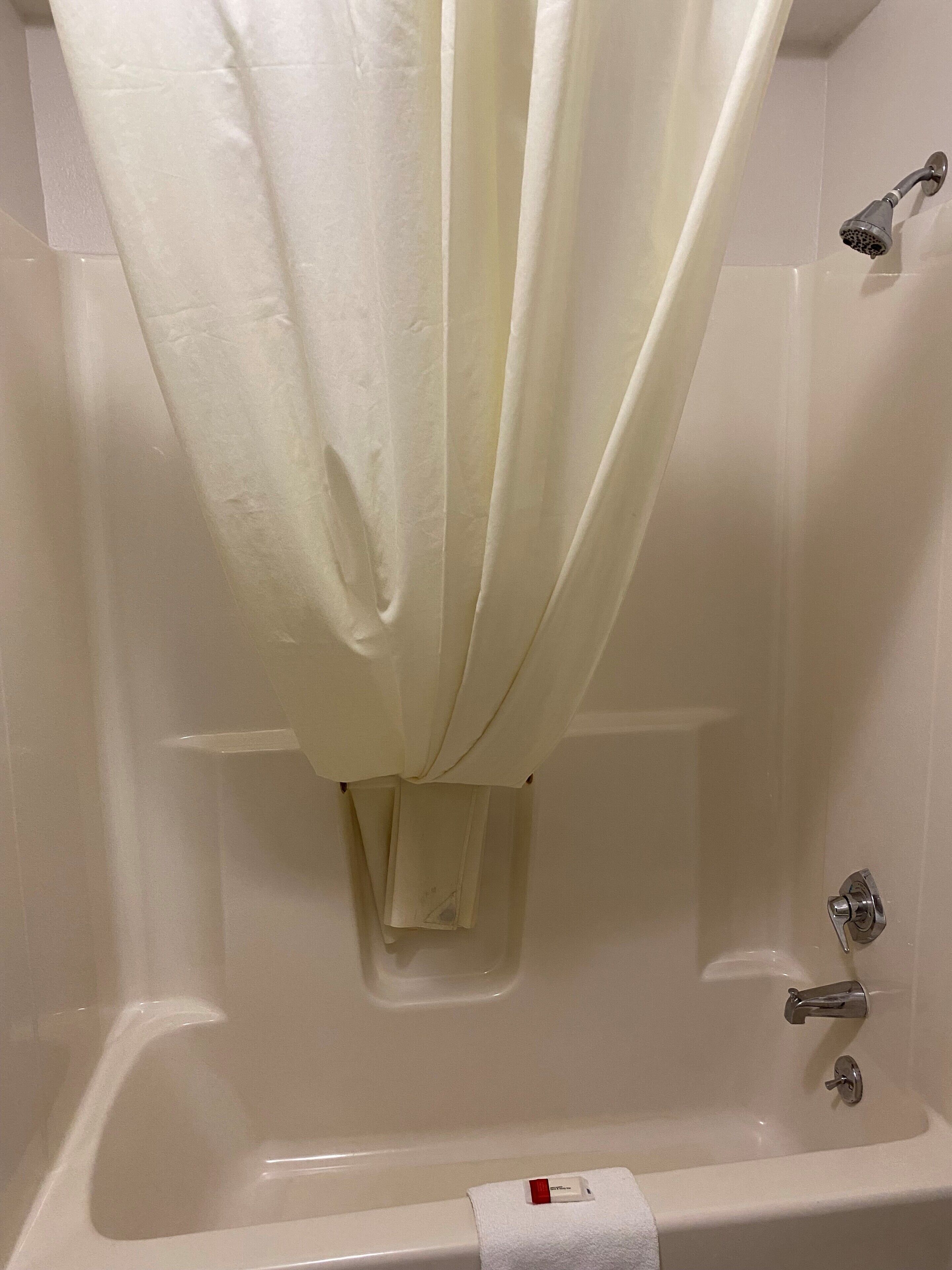combined shower/bathtub, free toiletries, hair dryer, towels