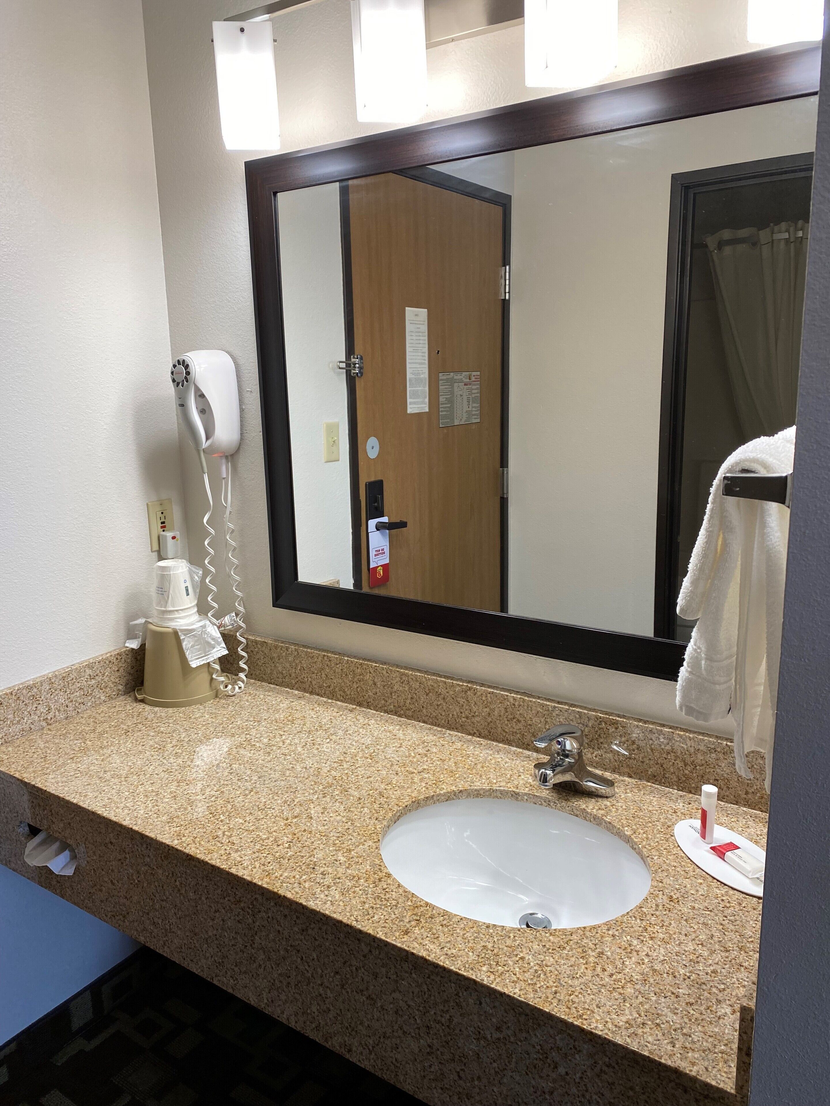 combined shower/bathtub, free toiletries, hair dryer, towels