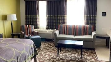 Suite, 1 King Bed, Non Smoking | Individually decorated, individually furnished, desk, laptop workspace