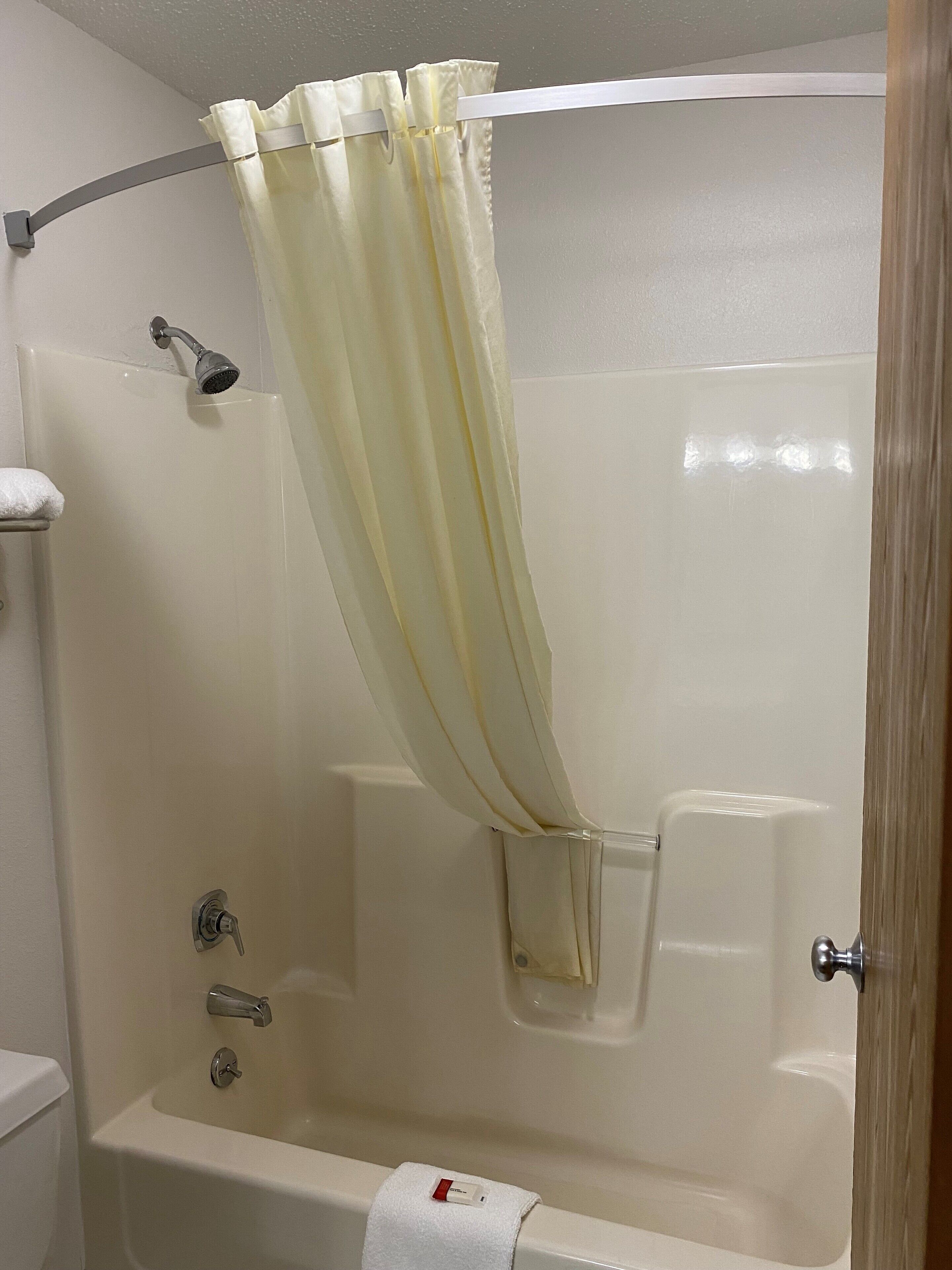 combined shower/bathtub, free toiletries, hair dryer, towels