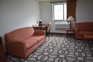 Suite, 1 King Bed, Smoking | In-room safe, desk, iron/ironing board, free cribs/infant beds