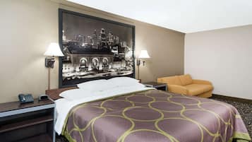 Tabla de planchar con plancha, wifi gratis y ropa de cama