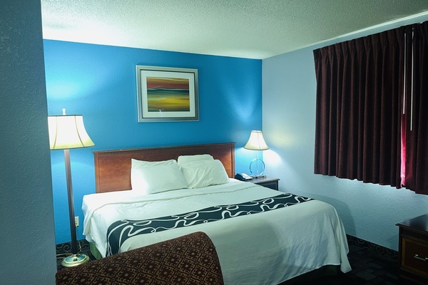 Down comforters, memory foam beds, desk, blackout drapes