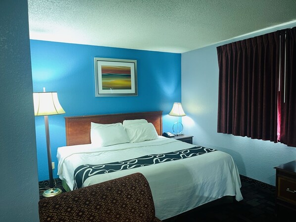 Down comforters, memory foam beds, desk, blackout drapes