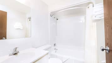 Combined shower/bathtub, hair dryer, towels, soap