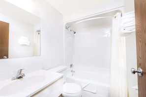 Combined shower/bathtub, hair dryer, towels, soap