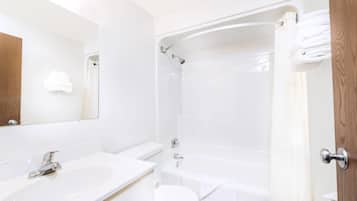 Combined shower/tub, hair dryer, towels, soap