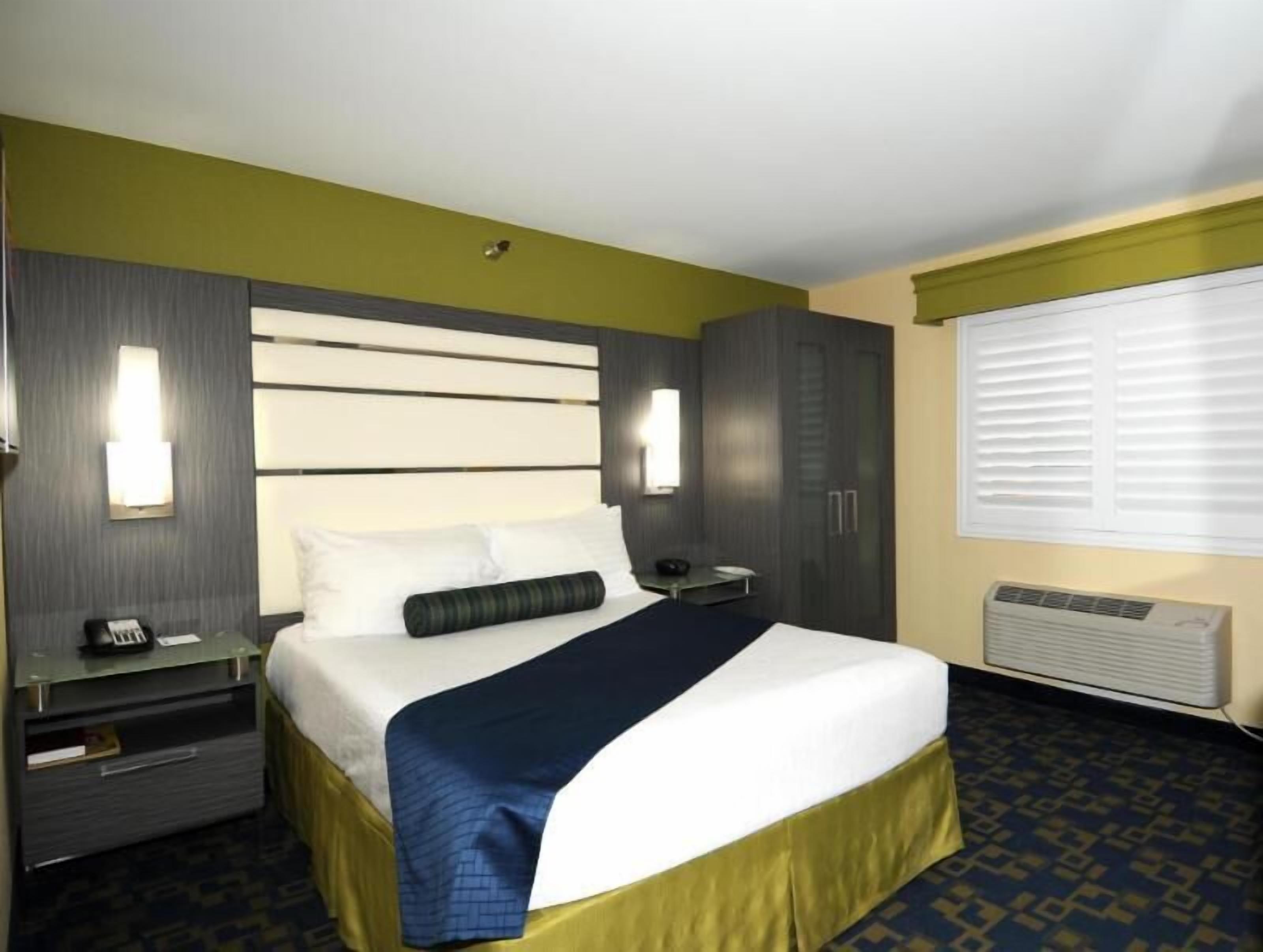 Desk, laptop workspace, iron/ironing board, free cots/infant beds