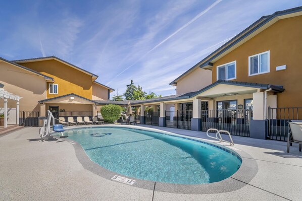 Outdoor pool, open 9:00 AM to 10:00 PM, pool umbrellas, sun loungers
