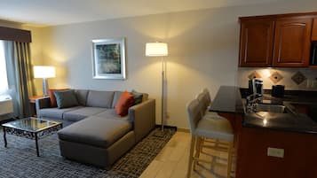 Suite, 1 King Bed with Sofa bed | In-room safe, iron/ironing board, free cribs/infant beds, rollaway beds