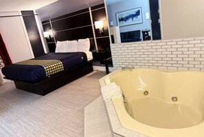 1 King Suite Jacuzzi, Non Smoking | Hypo-allergenic bedding, in-room safe, laptop workspace, blackout drapes - Coratel Inn & Suites by Jasper Hastings (Hastings)