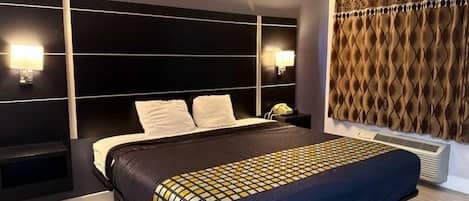 Hypo-allergenic bedding, in-room safe, laptop workspace, blackout drapes