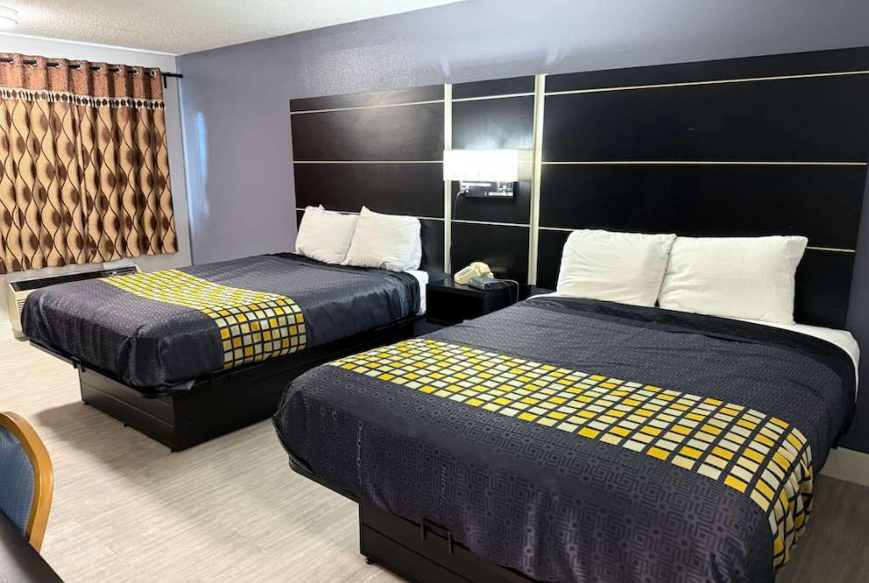 Hypo-allergenic bedding, in-room safe, laptop workspace