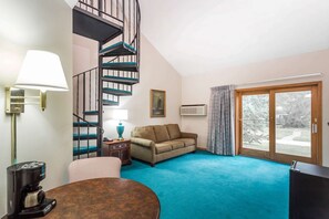 Deluxe Suite, Multiple Beds, Non Smoking | Individually decorated, individually furnished, laptop workspace