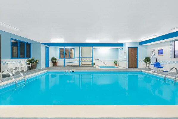 Indoor pool, open 11:00 AM to 10:00 PM, pool loungers