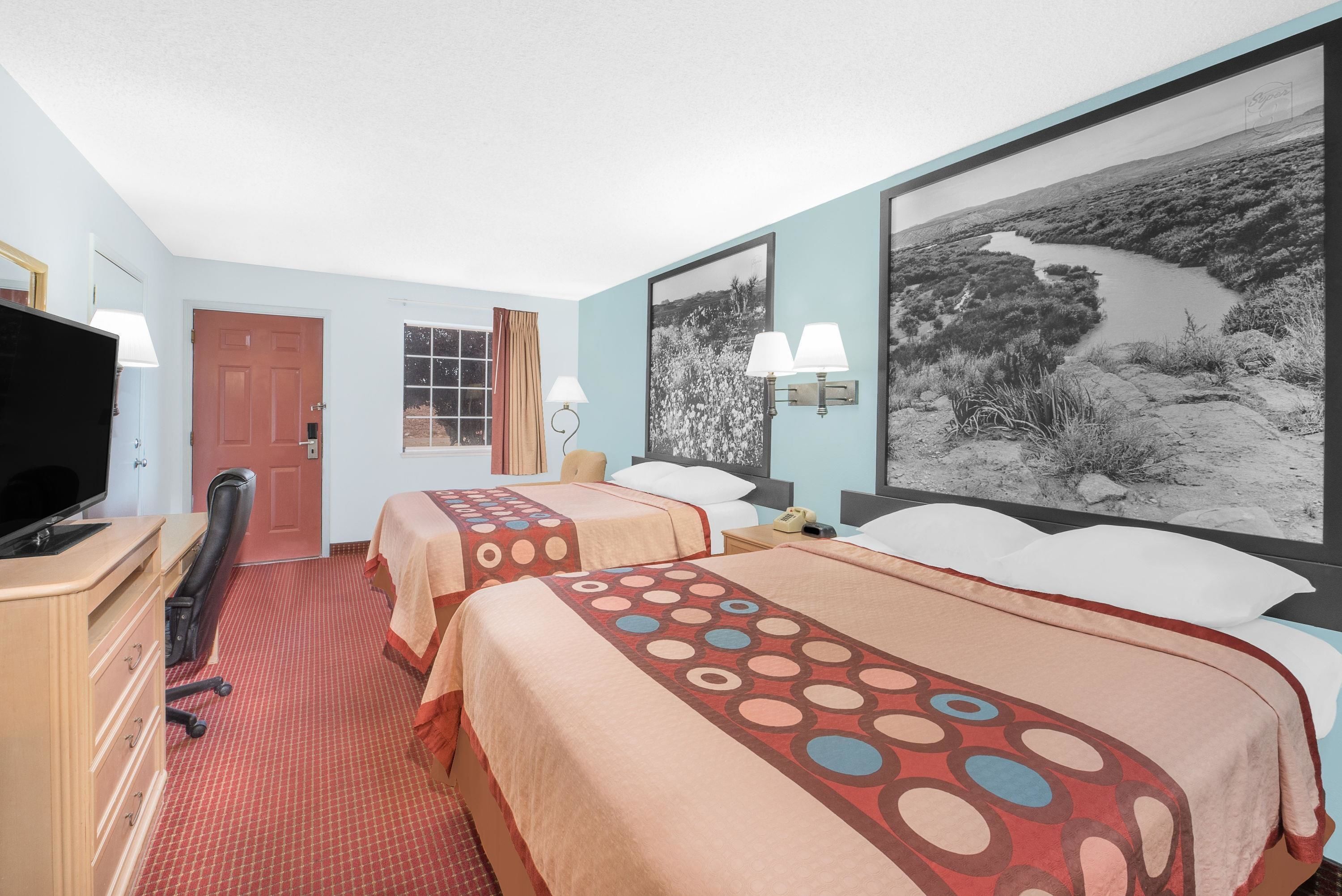 Down duvets, desk, laptop workspace, blackout curtains