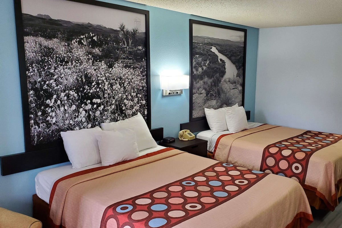 Down comforters, desk, laptop workspace, blackout drapes