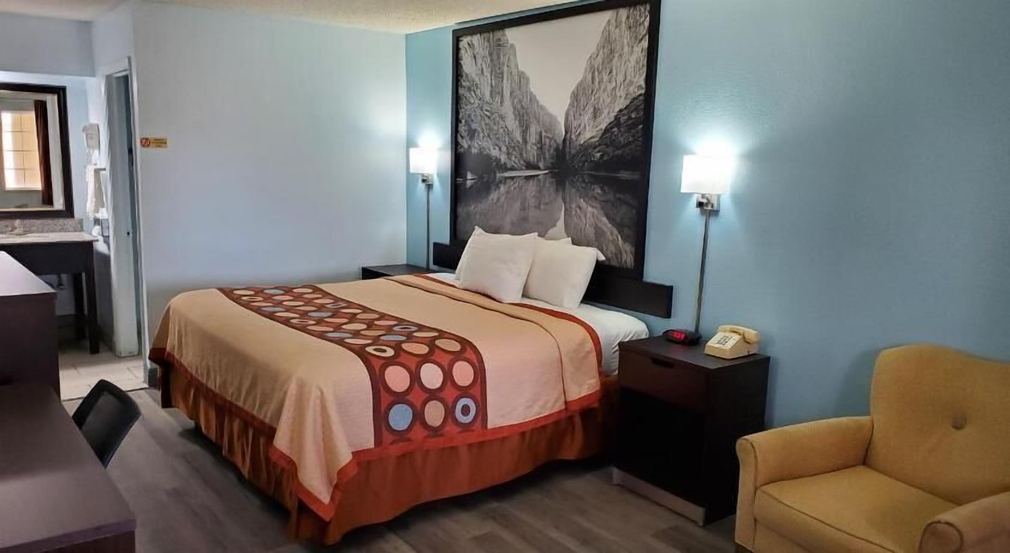 Down duvets, desk, laptop workspace, blackout curtains