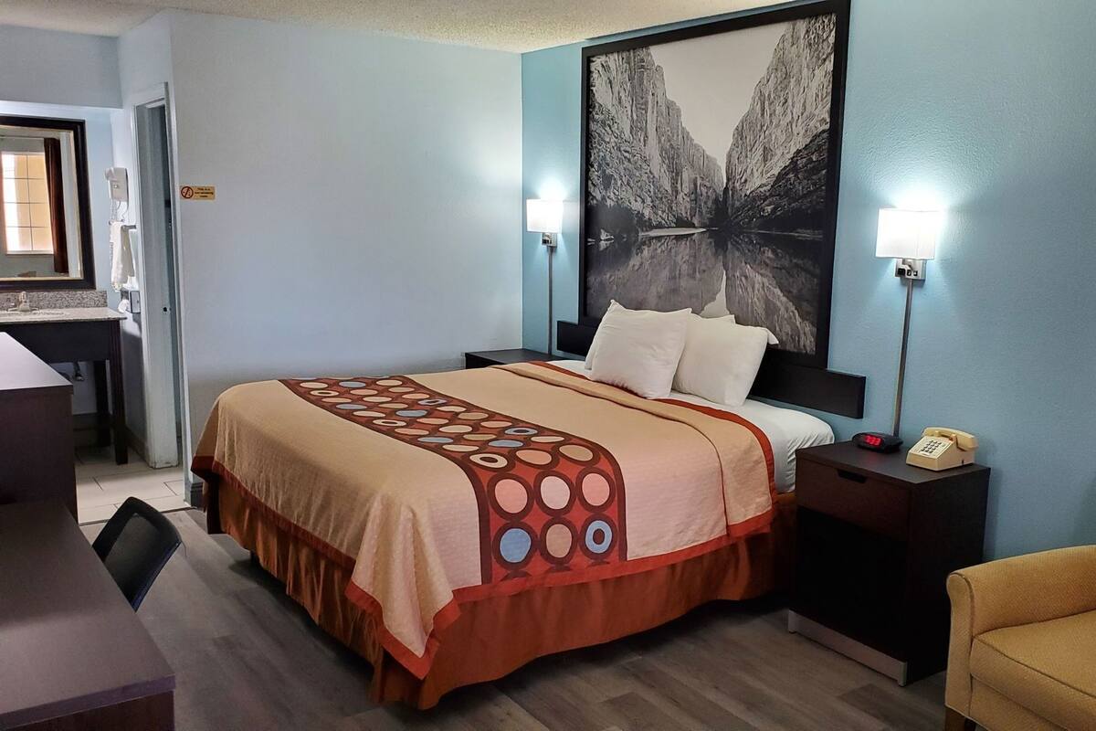 Down comforters, desk, laptop workspace, blackout drapes