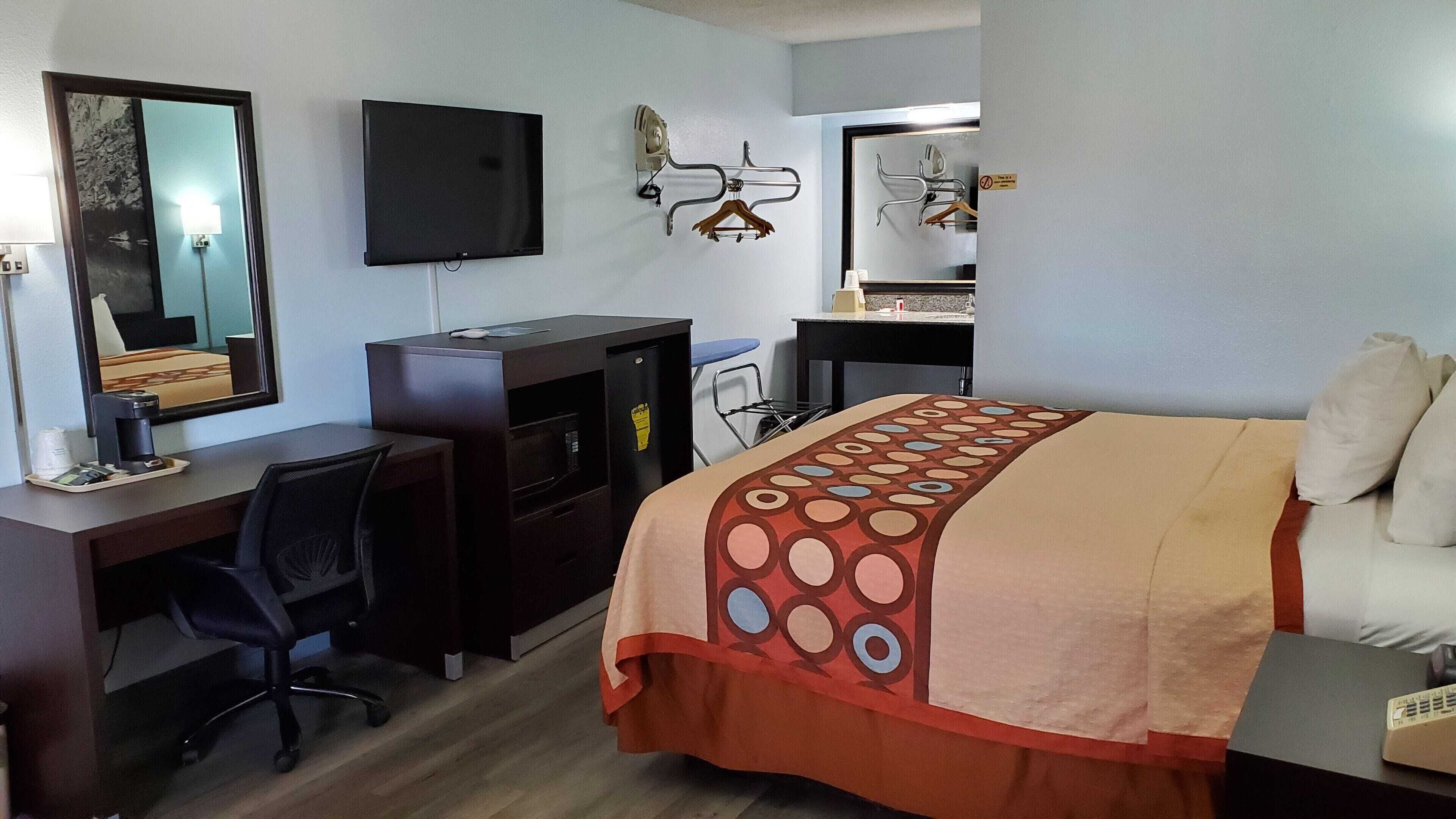 Down duvets, desk, laptop workspace, blackout curtains