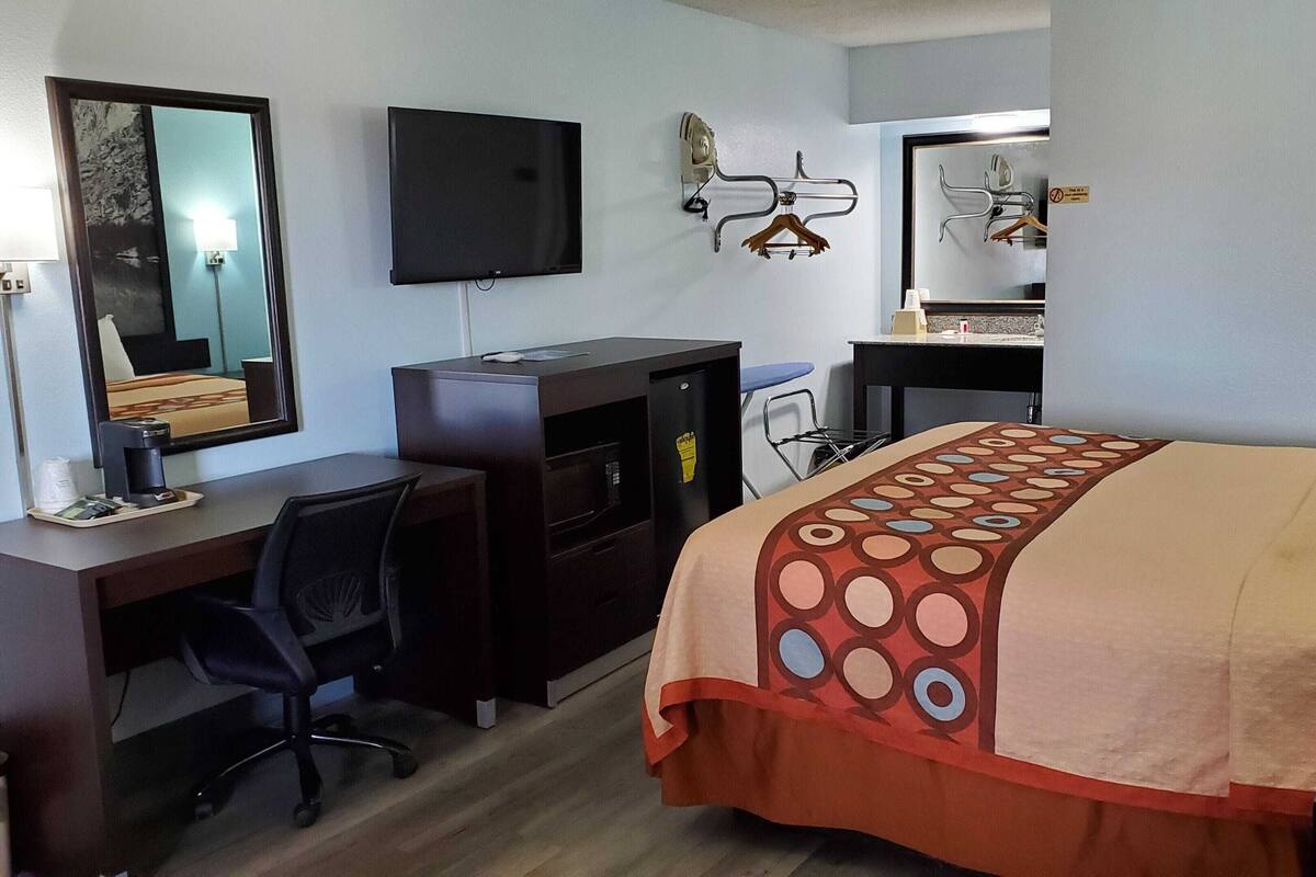 Down comforters, desk, laptop workspace, blackout drapes