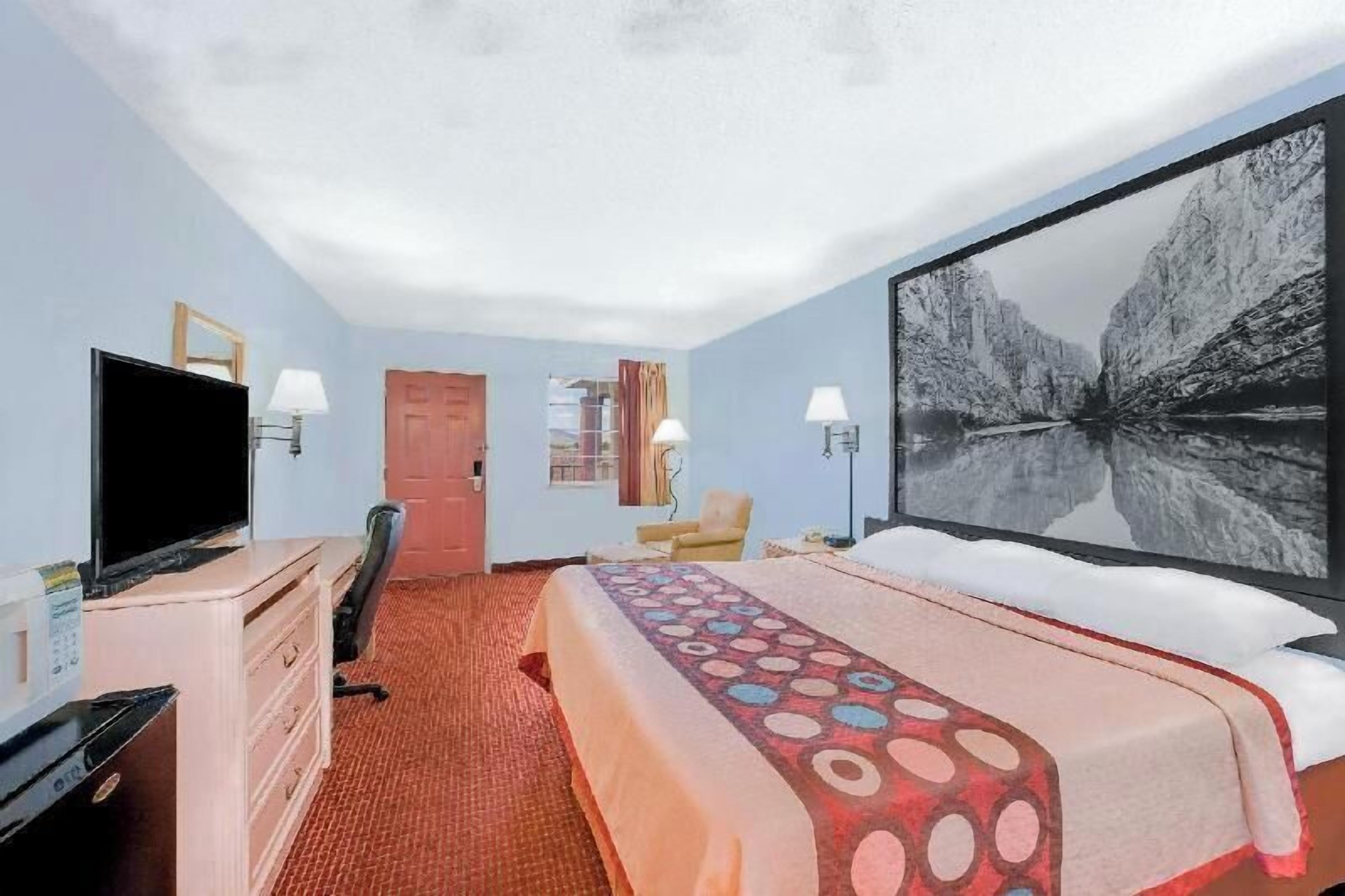 Down duvets, desk, laptop workspace, blackout curtains