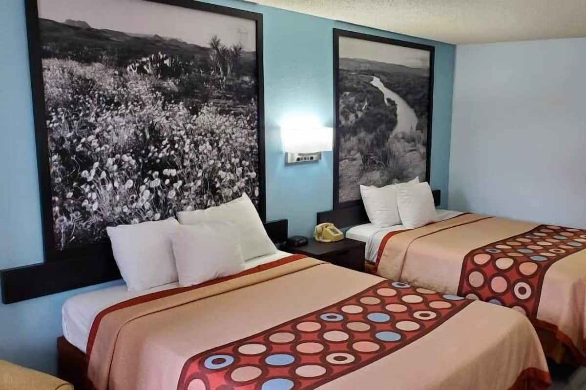 Down comforters, desk, laptop workspace, blackout drapes