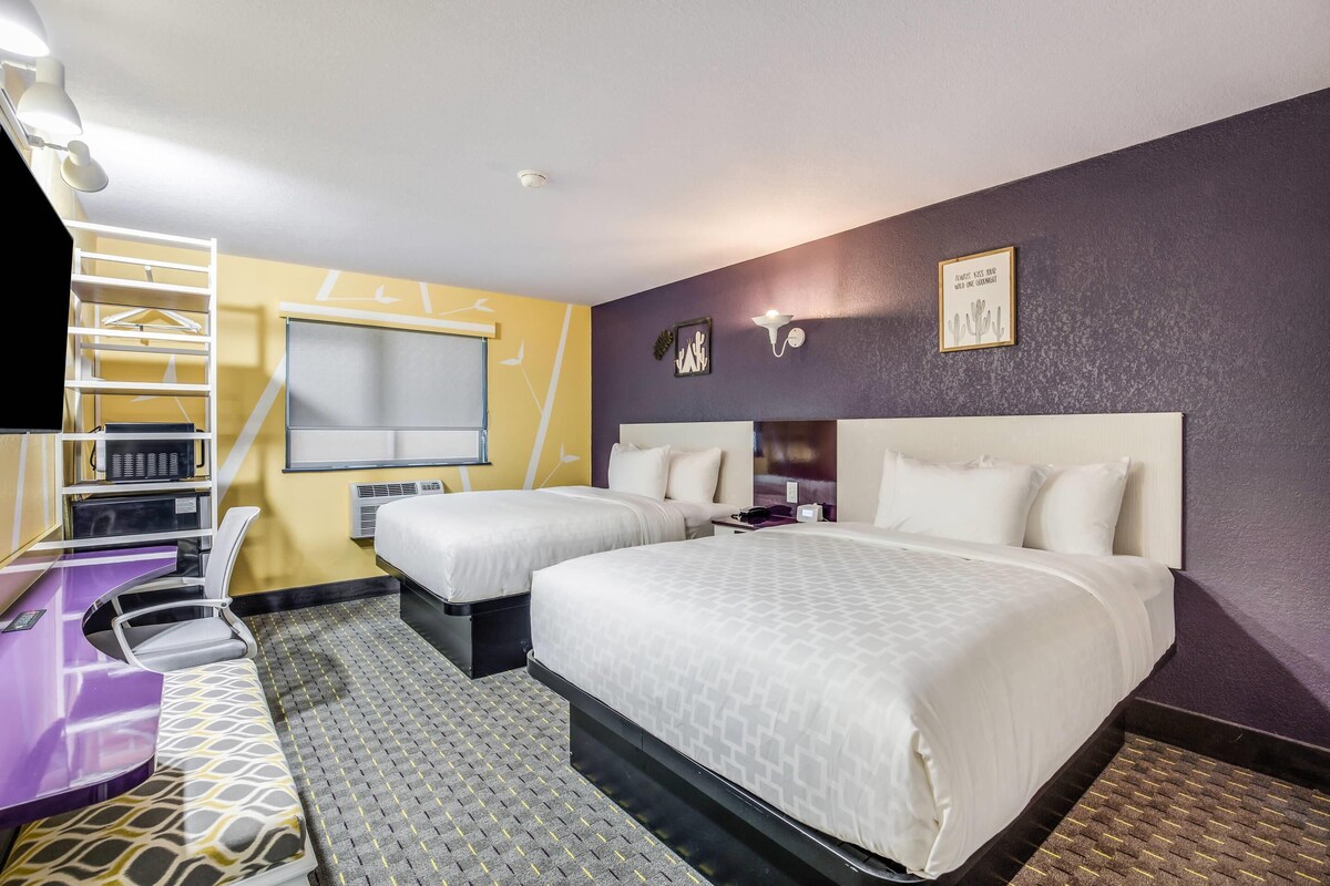 Blackout drapes, iron/ironing board, WiFi (free), alarm clocks