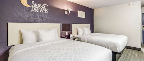 Blackout drapes, iron/ironing board, free WiFi, alarm clocks