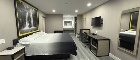 Quarto standard, 1 cama King | Berços grátis, camas extras/dobráveis, Wi-Fi de cortesia, roupa de cama