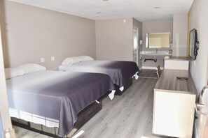 Standard Room, 2 Queen Beds | Free cribs/infant beds, free rollaway beds, free WiFi, bed sheets