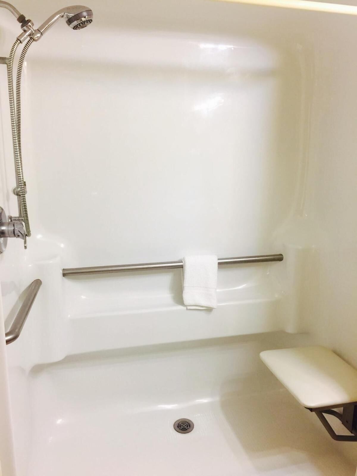 Combined shower/tub, hair dryer, bathrobes, towels