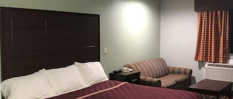 Standard Room, 1 King Bed, Non Smoking | Down comforters, desk, iron/ironing board, free WiFi