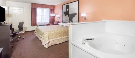 套房, 1 張特大雙人床, 非吸煙房, 按摩浴缸 | 書桌、遮光窗簾/窗簾、免費 Wi-Fi、床單