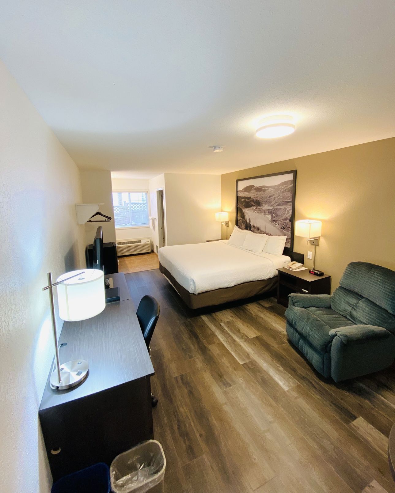 Desk, laptop workspace, blackout curtains, free WiFi