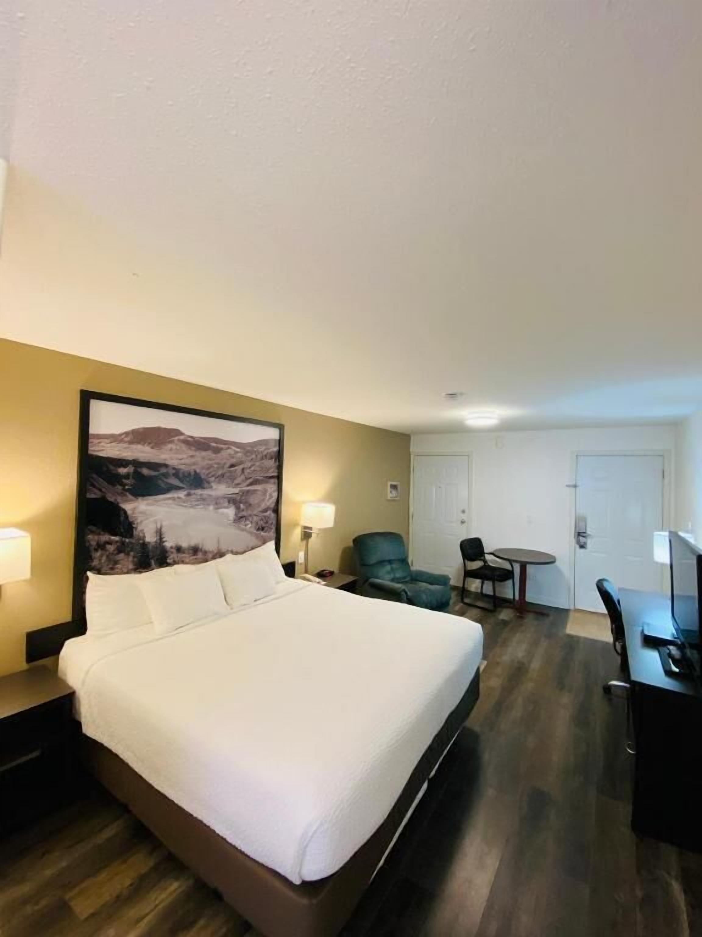 Desk, laptop workspace, blackout curtains, free WiFi