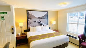 Junior Suite, 1 King Bed, Non Smoking | Desk, laptop workspace, blackout drapes, free WiFi