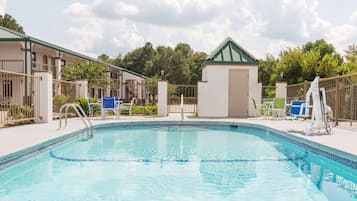 Seasonal outdoor pool, open 9:00 AM to 9:00 PM, pool loungers