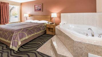 Deluxe Room, 1 King Bed, Non Smoking | Iron/ironing board, free cribs/infant beds, rollaway beds, free WiFi