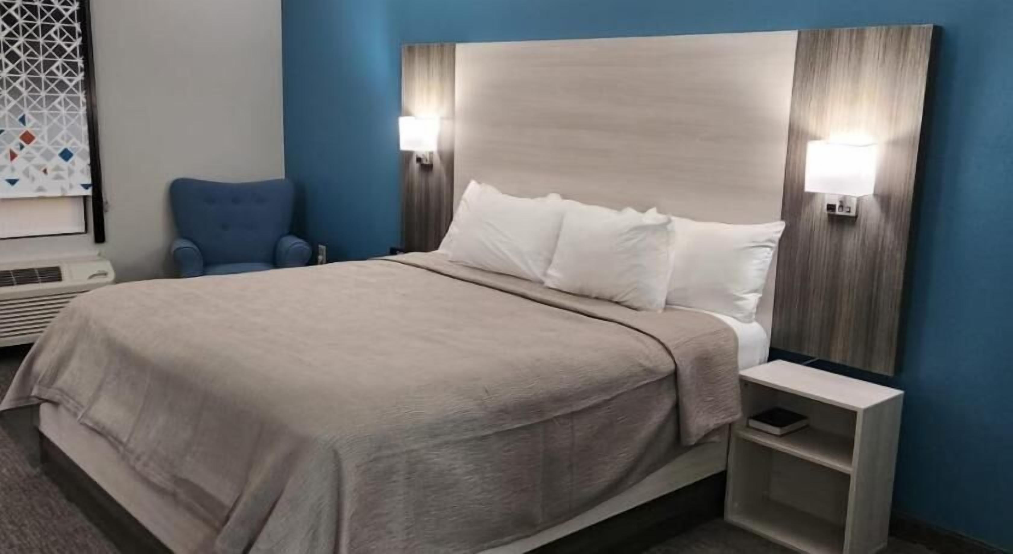 Laptop workspace, free WiFi, bed sheets, alarm clocks