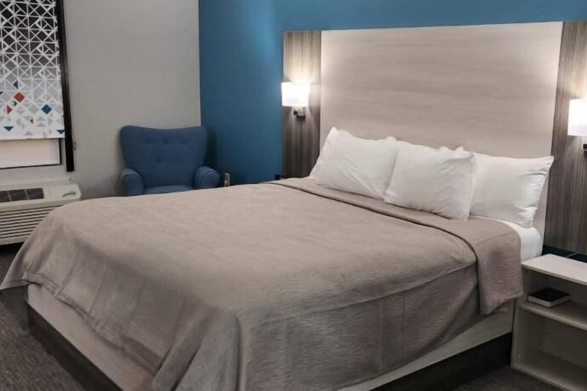 Laptop workspace, free WiFi, bed sheets, alarm clocks