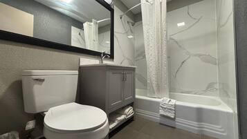 Shower, free toiletries, hair dryer, towels