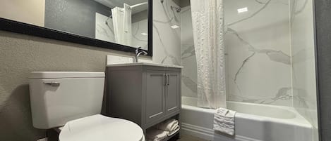 Shower, free toiletries, hair dryer, towels